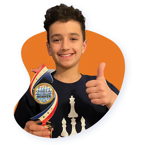 A smiling Chess4Life player holding a trophy