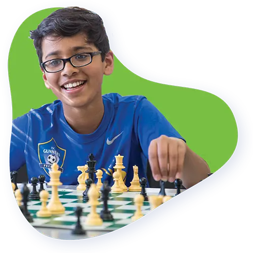 A young Chess4Life player making a move